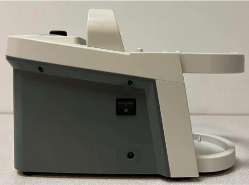 Suction machine (with no supplies) - side view